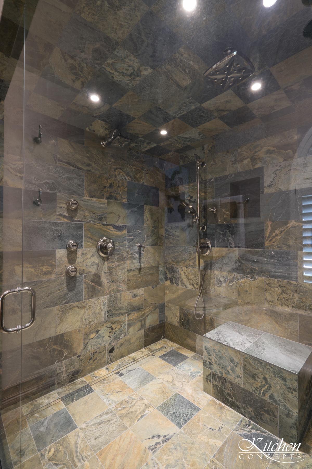 Large Bathroom Remodel With Classic Tub And Stone Tiled Walk